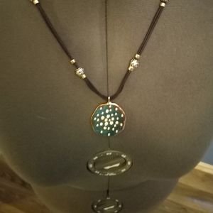 Necklace and earrings set. Goldtone Reversable earrings and pendant